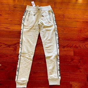 Justice girls logo striped zipper joggers size 10 Oatmeal